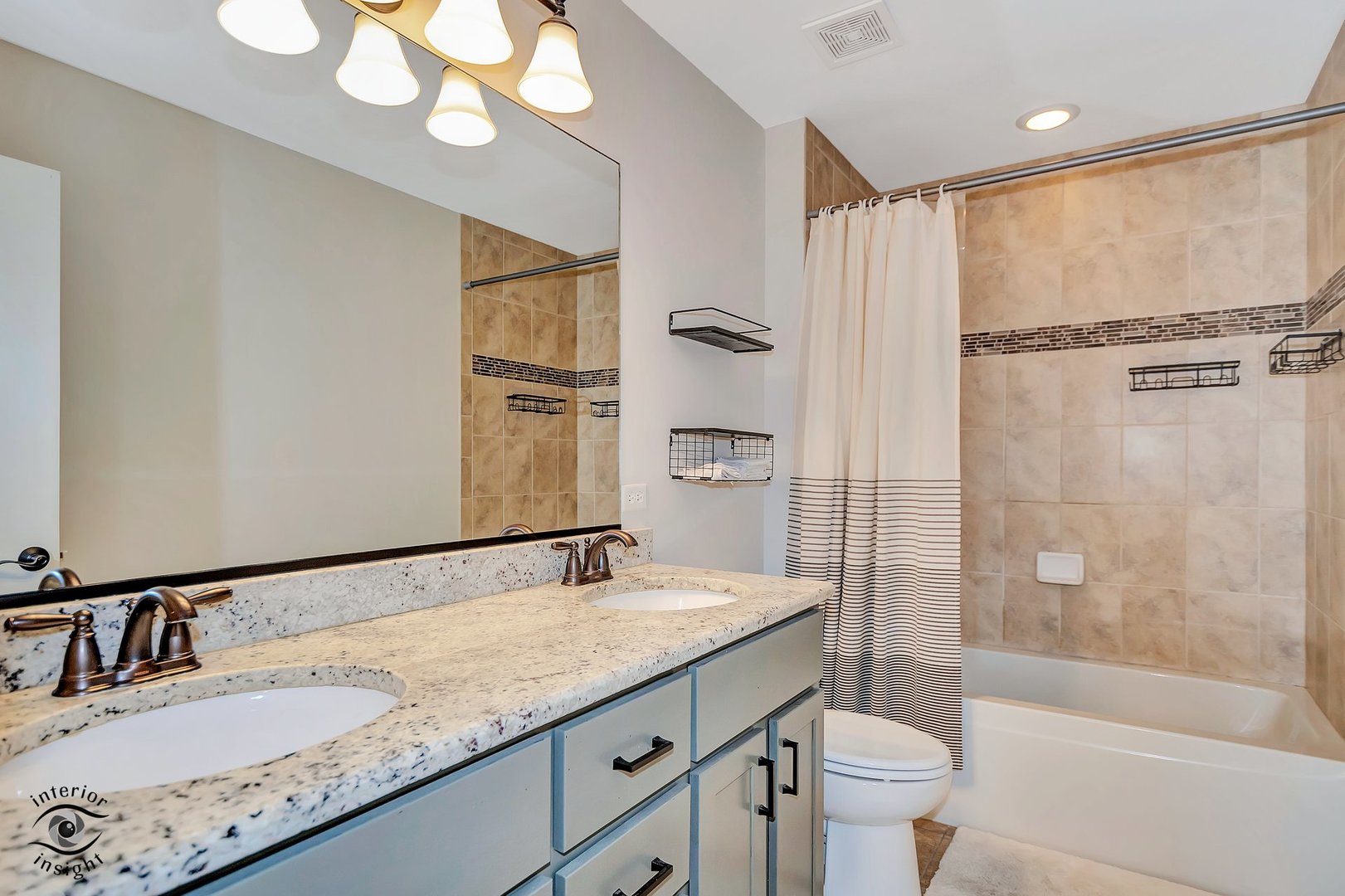 13754 Memorial Drive Manhattan, IL 60442 - Photo 26 of 37 a bathroom with a granite countertop sink a toilet and shower