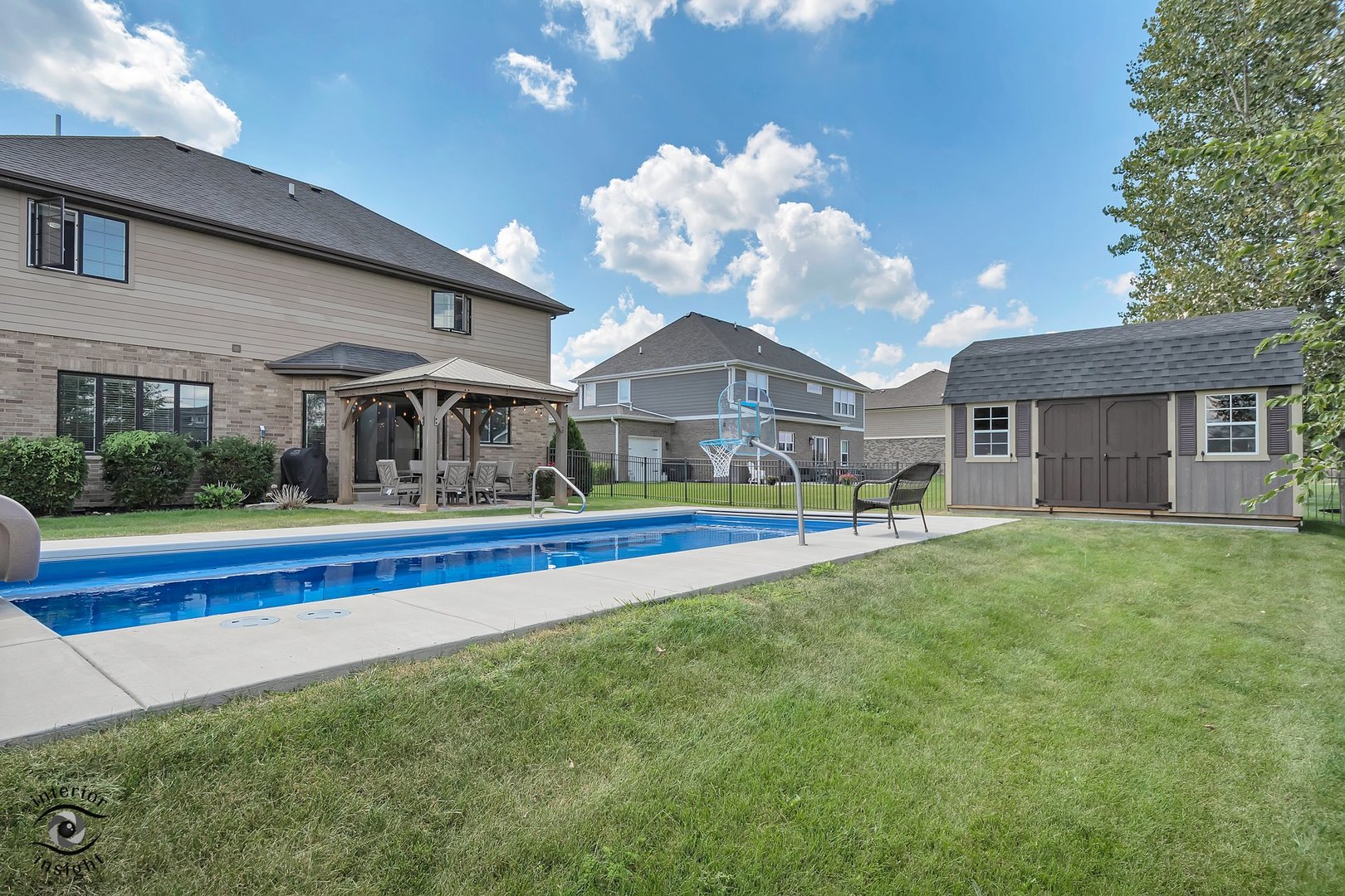 13754 Memorial Drive Manhattan, IL 60442 - Photo 37 of 37 a front view of house with yard and outdoor seating
