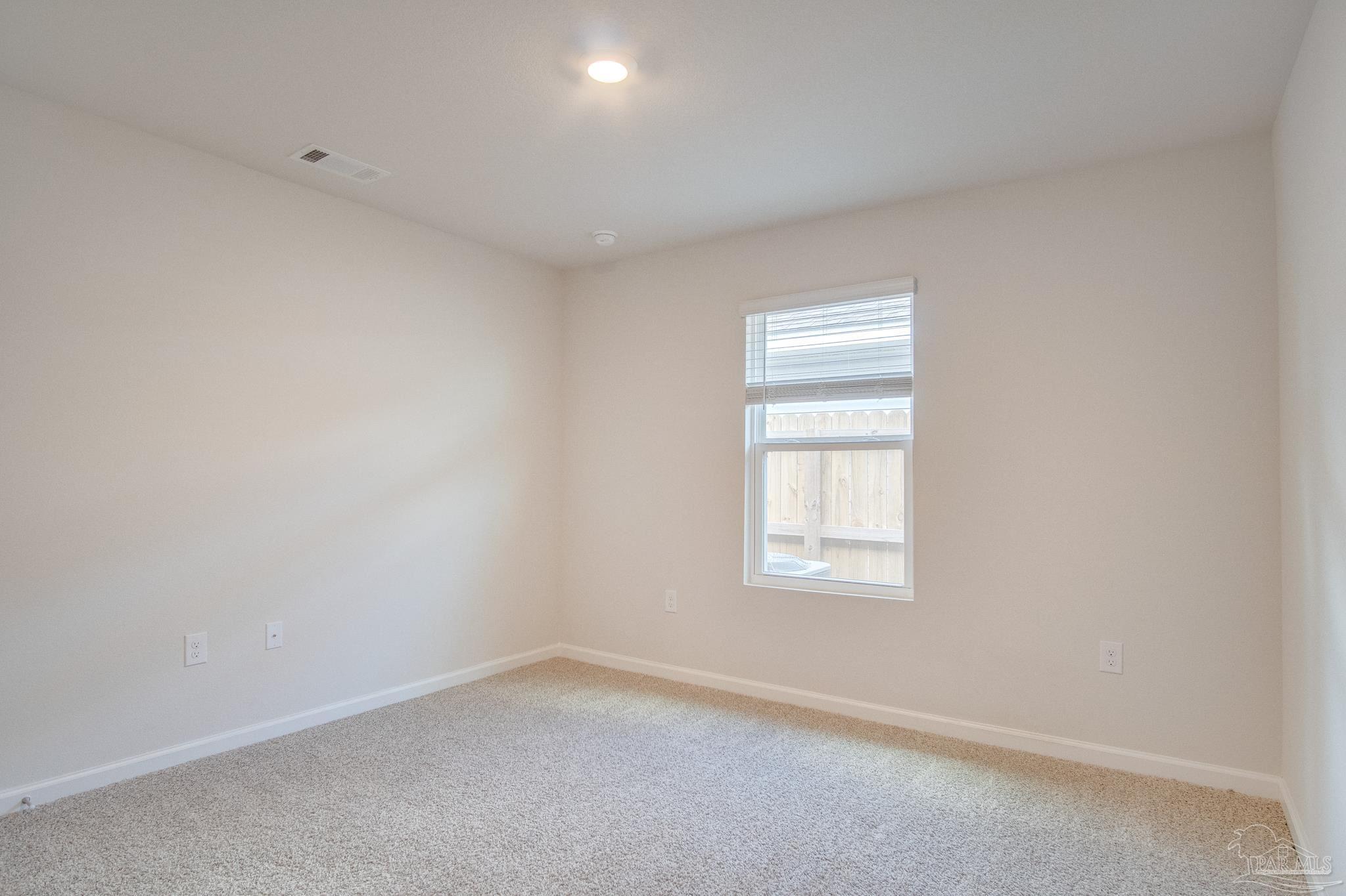 4383 White Cedar Court Pace, FL 32571 - Photo 26 of 36 an empty room with a window