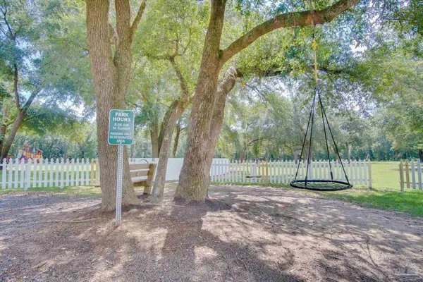 a view of a backyard with a small cabin