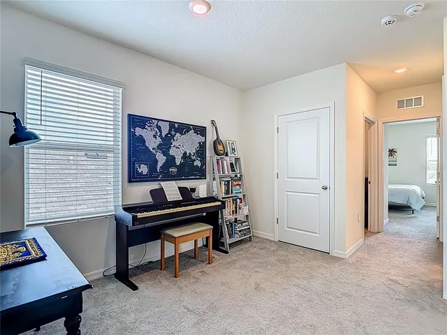 a bedroom with a bed and a closet