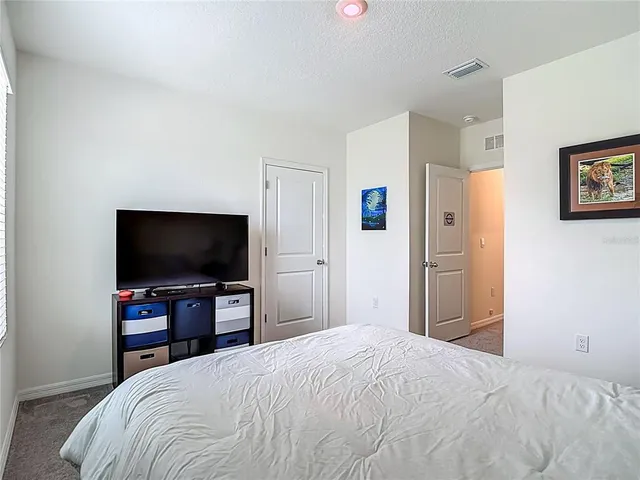 a livingroom with window and a couch