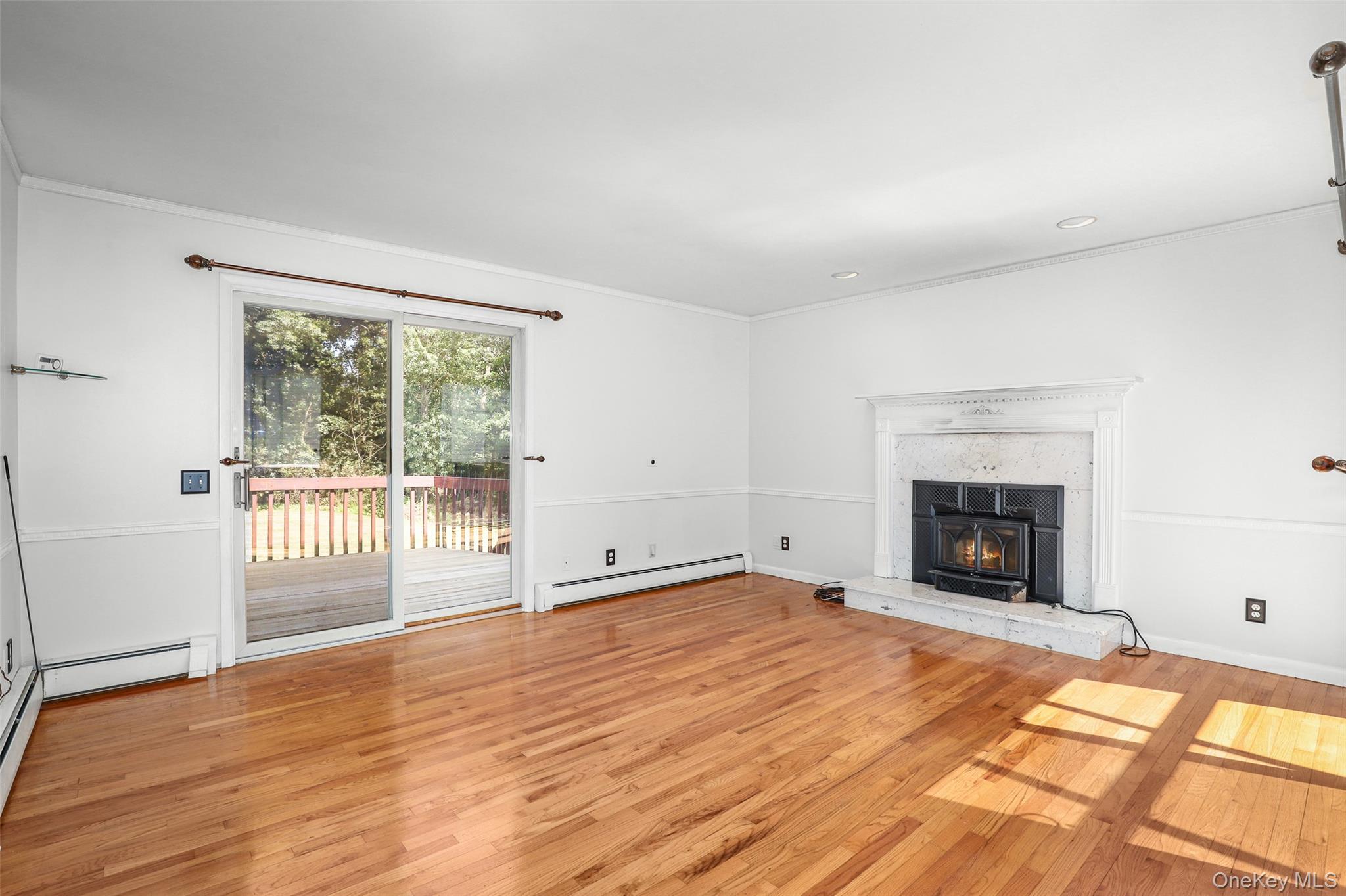 30 Eddy Road Verbank, NY 12585 - Photo 12 of 31 a view of an empty room with wooden floor and a window