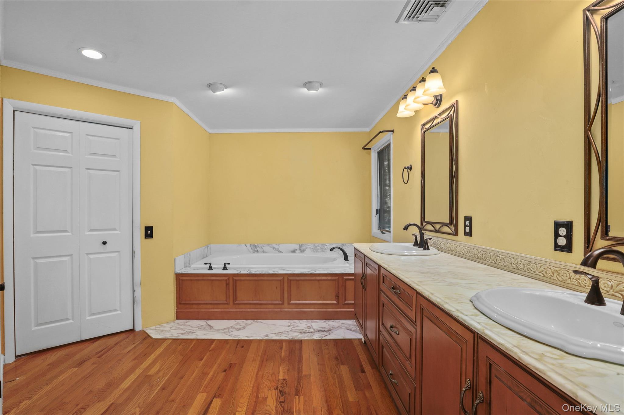 30 Eddy Road Verbank, NY 12585 - Photo 16 of 31 a spacious bathroom with a granite countertop sink and a mirror