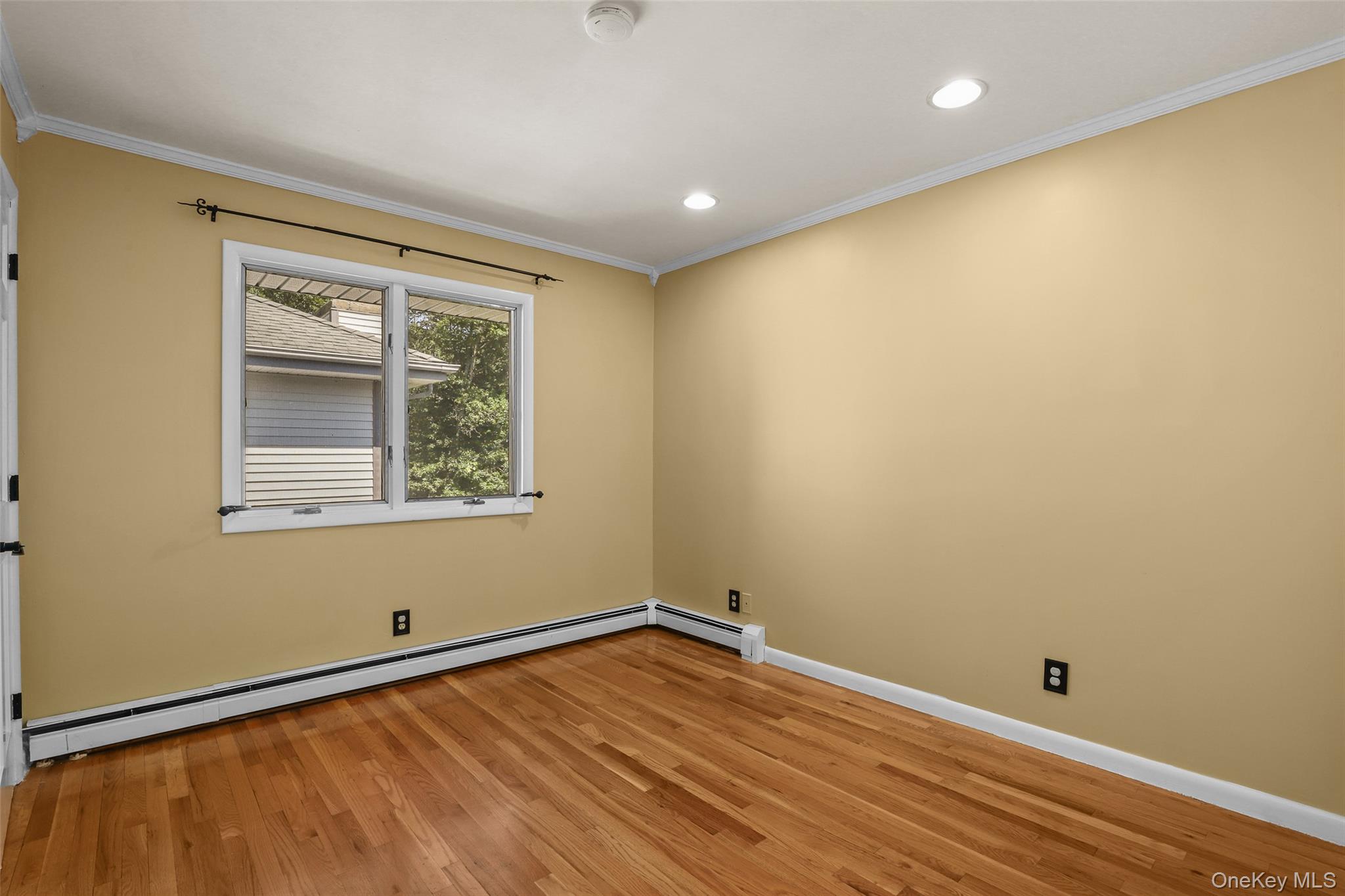 30 Eddy Road Verbank, NY 12585 - Photo 18 of 31 an empty room with a wooden floor and window