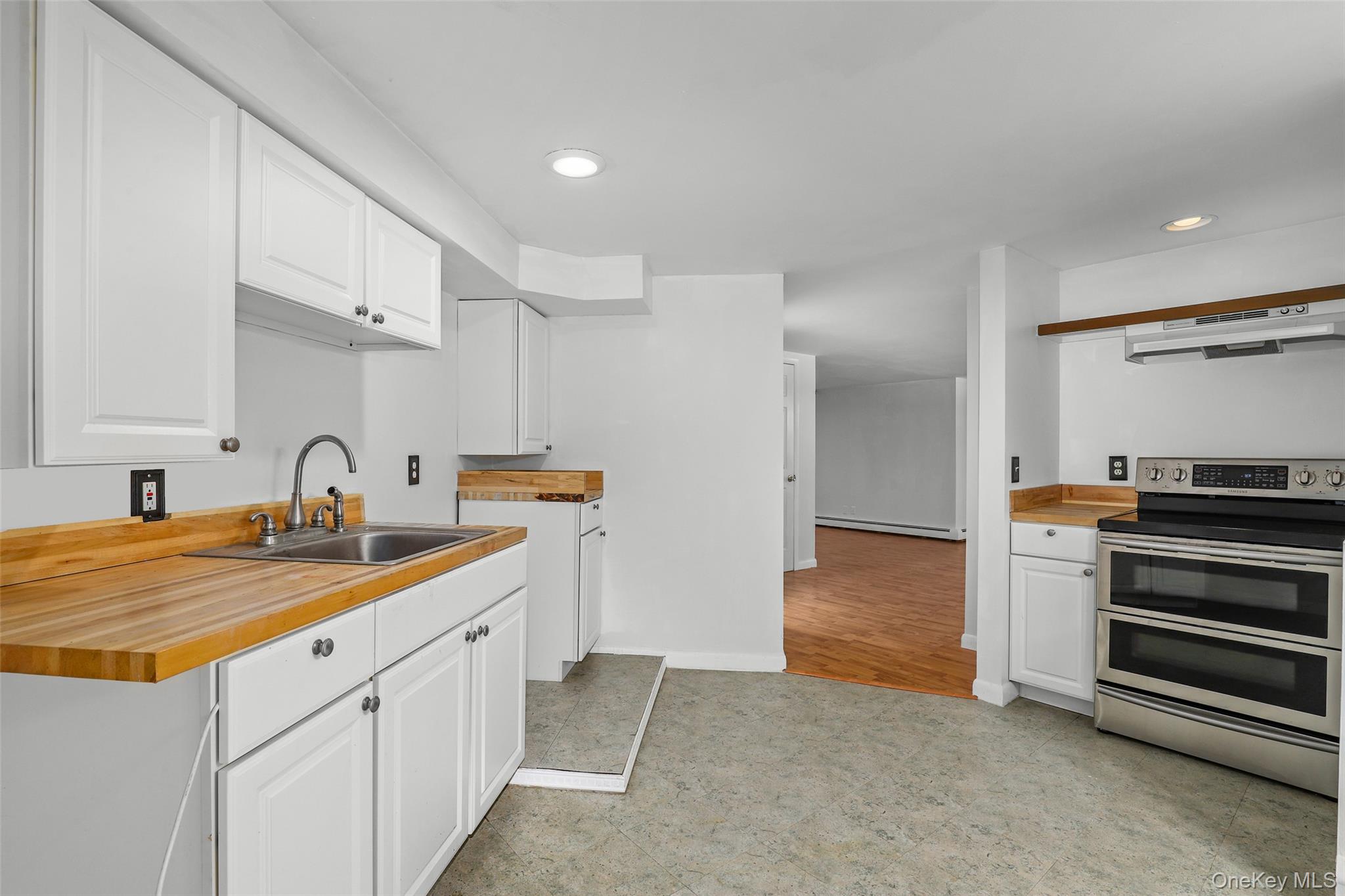 30 Eddy Road Verbank, NY 12585 - Photo 26 of 31 a kitchen with white cabinets and sink