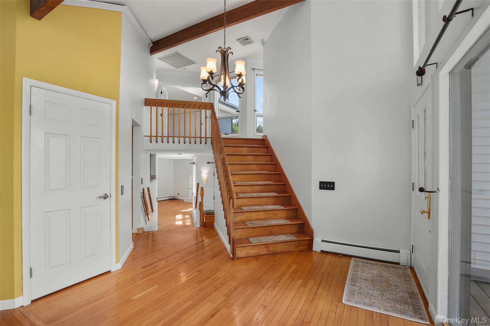 30 Eddy Road Verbank, NY 12585 - Photo 3 of 31 a view of a hallway with wooden floor and staircase