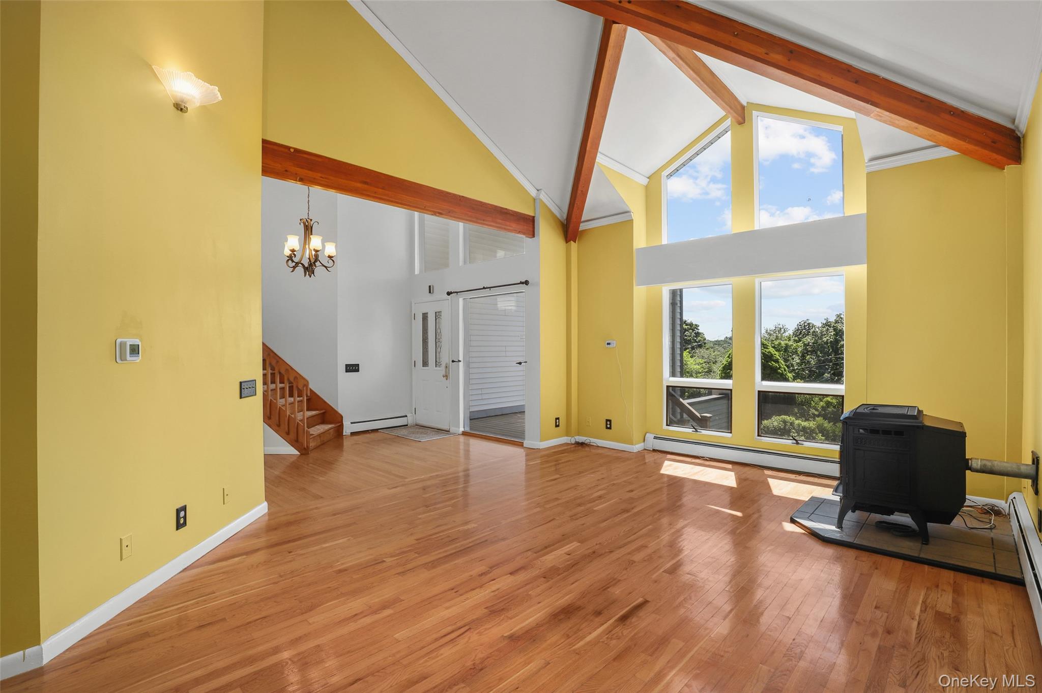 30 Eddy Road Verbank, NY 12585 - Photo 6 of 31 a view of an empty room with wooden floor and a window