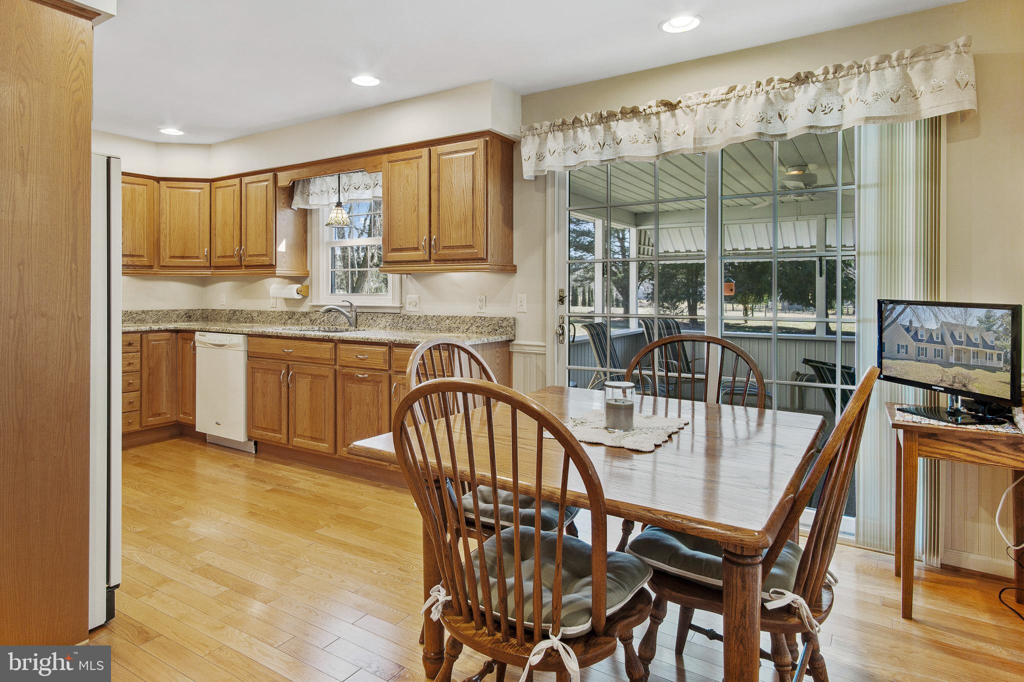 24 Middlecroft Road, Unit FAIR Elkton, MD 21921 - Photo 6 of 24 Sliding doors from the kitchen to the sun room