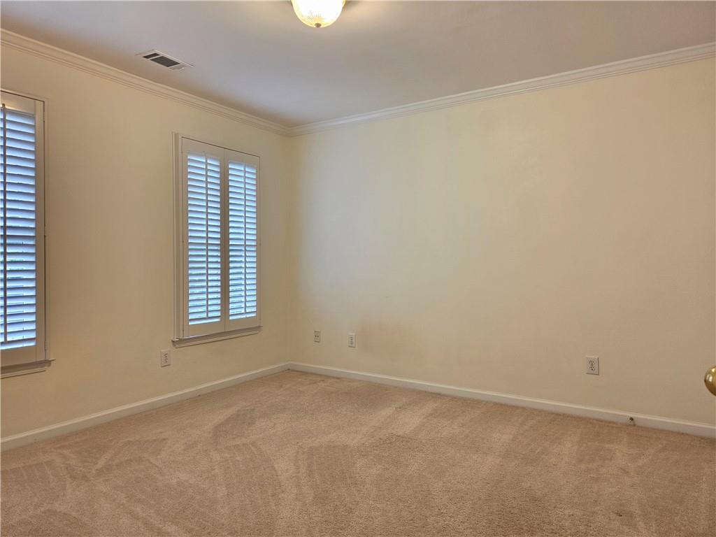 3715 Ridgeside Court Suwanee, GA 30024 - Photo 39 of 44 an empty room with a window