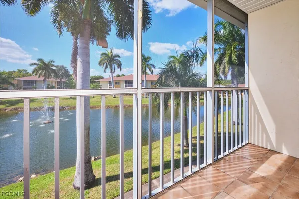 a view of a balcony with lake view