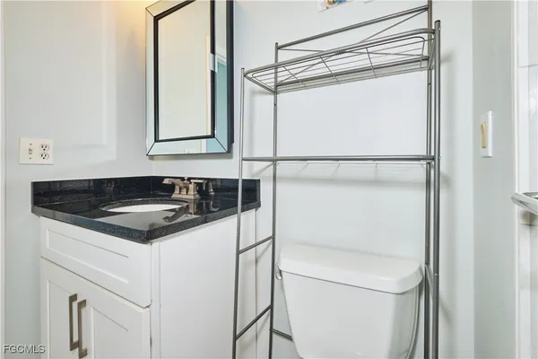 a white refrigerator freezer and a dishwasher