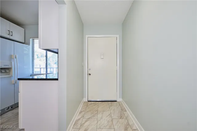 a view of an empty room with window