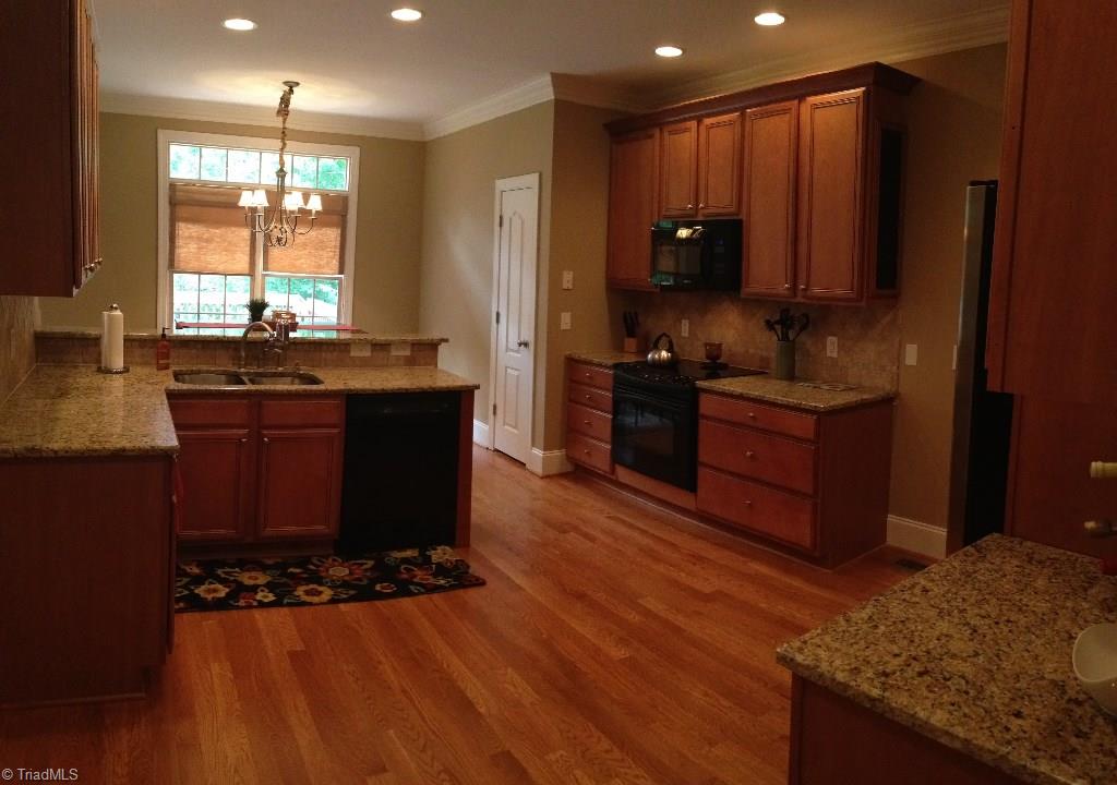 5820 Elkton Drive Oak Ridge, NC 27310 - Photo 3 of 16