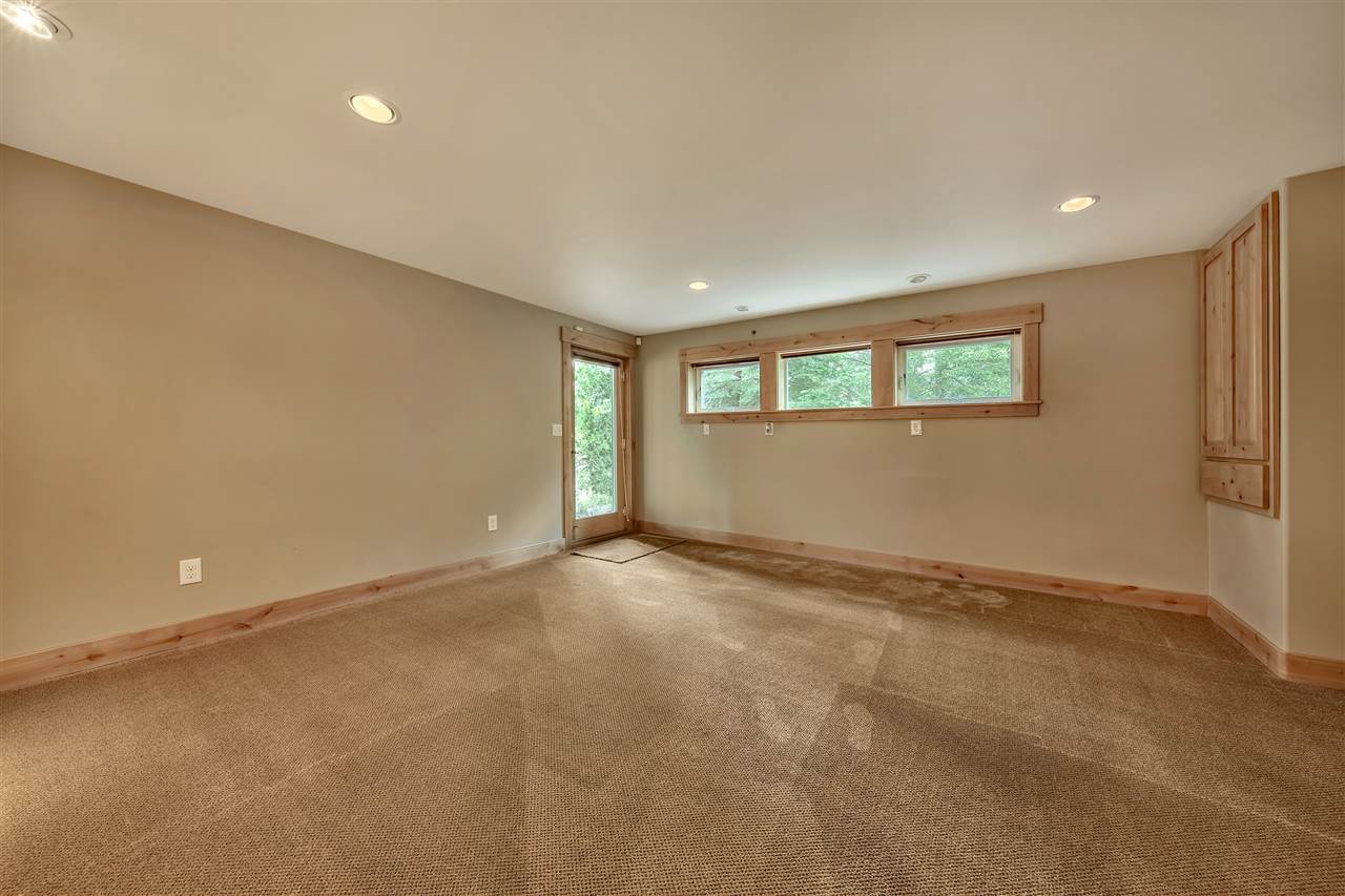 12464 Snowpeak Way Truckee, CA 96161 - Photo 20 of 21 an empty room with a empty space and windows