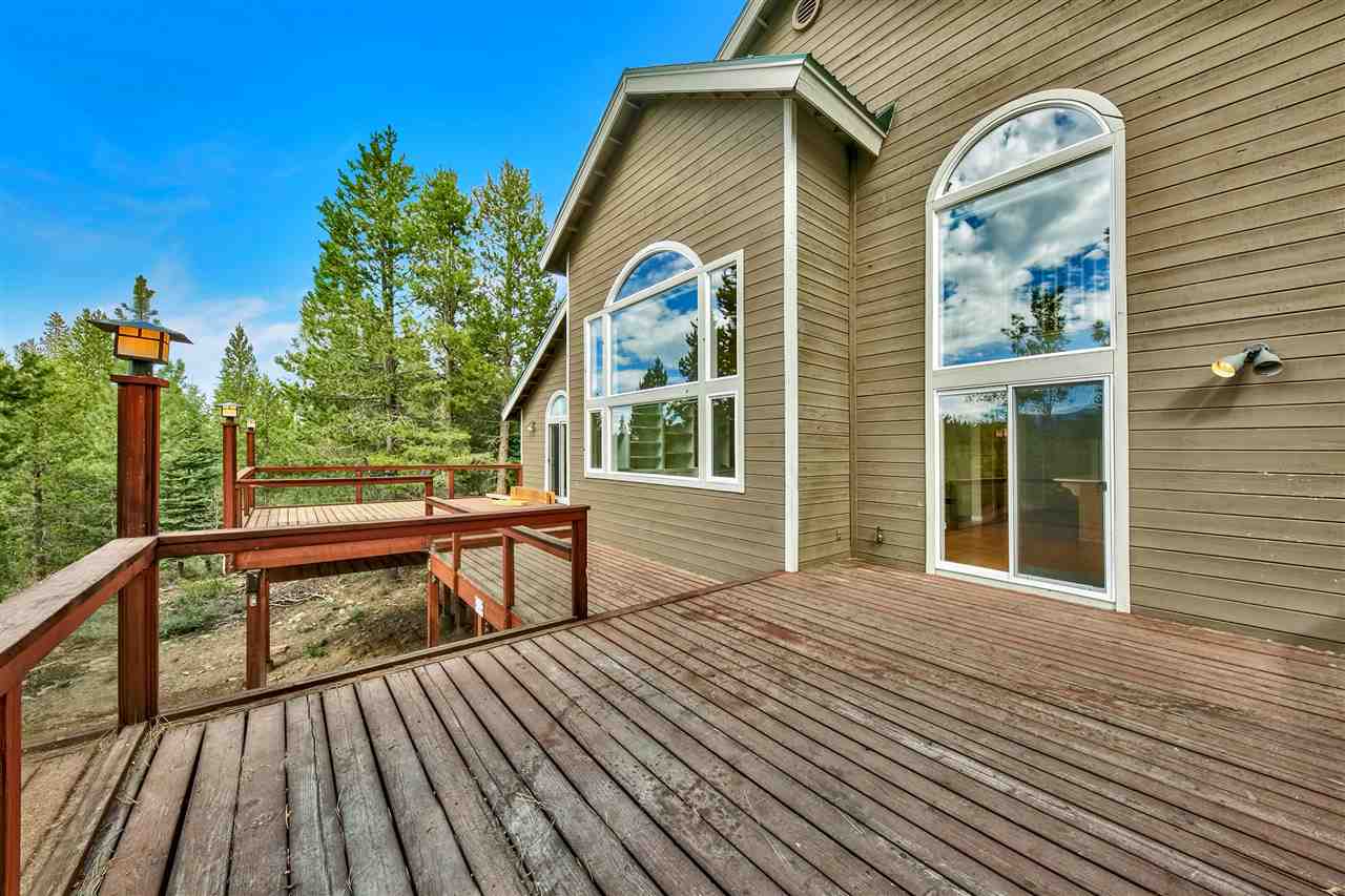 12464 Snowpeak Way Truckee, CA 96161 - Photo 4 of 21 a view of a wooden deck with a yard