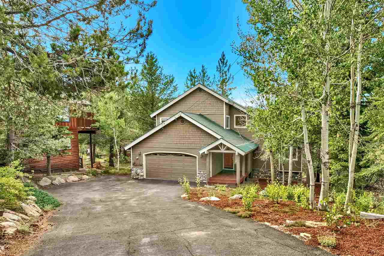 12464 Snowpeak Way Truckee, CA 96161 - Photo 7 of 21 a view of a house with a yard