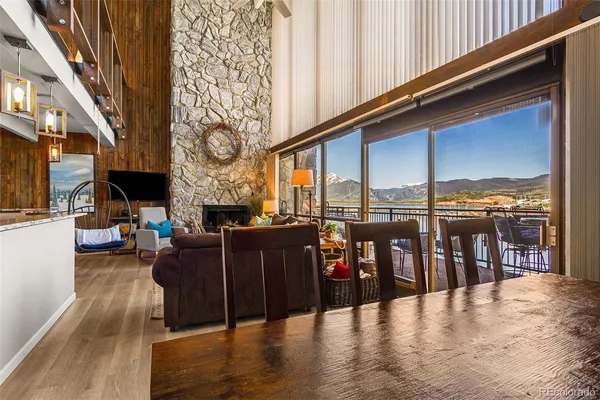 a view of a chairs and table in the balcony