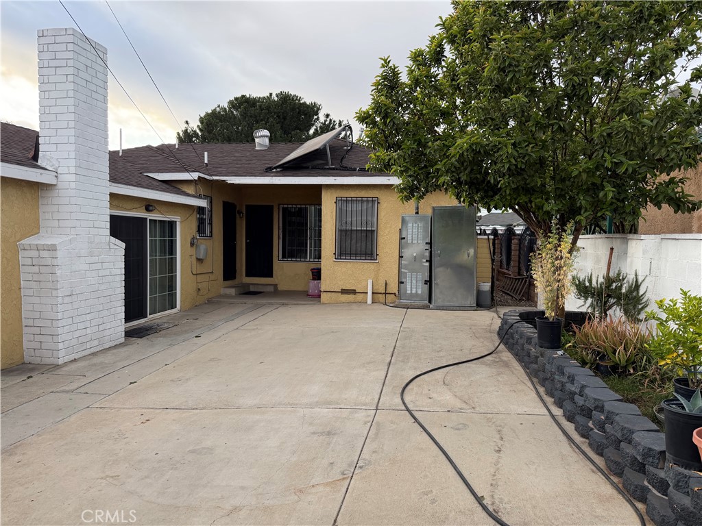 13116 Weidner Street Pacoima, CA 91331 - Photo 15 of 21 a view of a house with a backyard