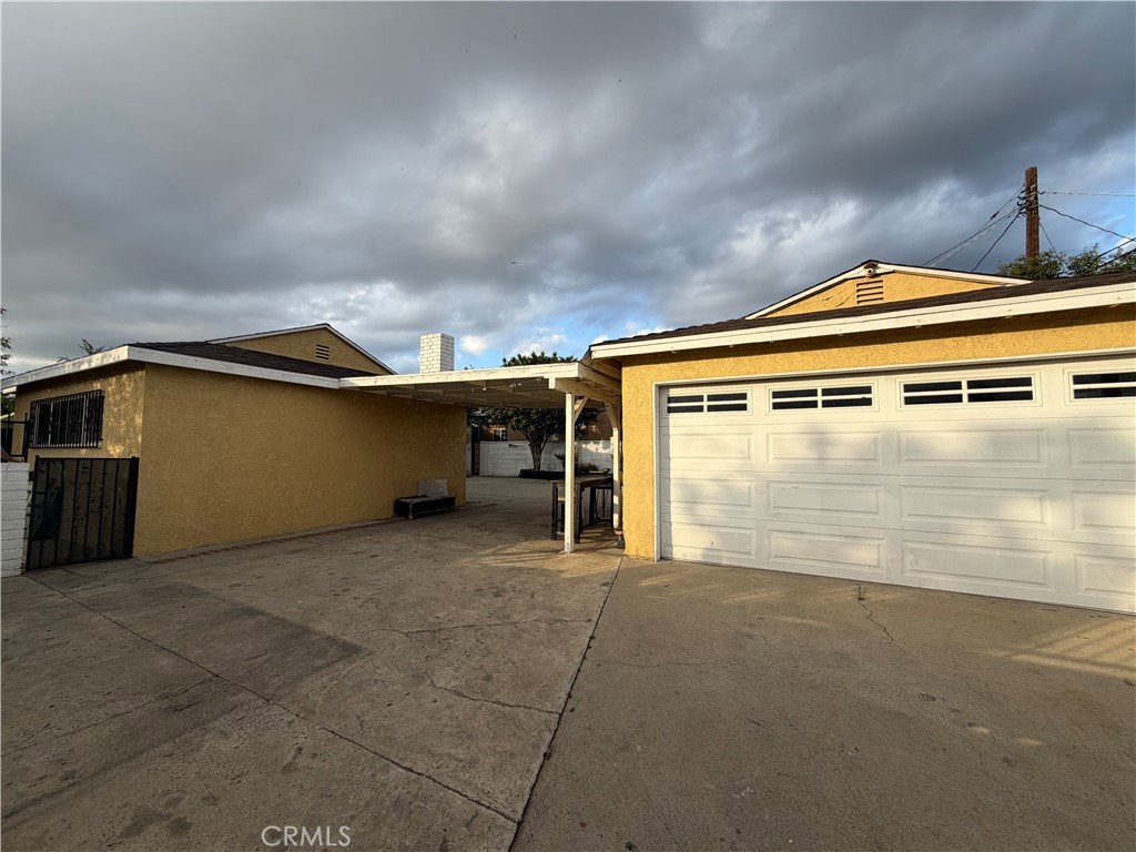 13116 Weidner Street Pacoima, CA 91331 - Photo 20 of 21 a view of a house with a garage