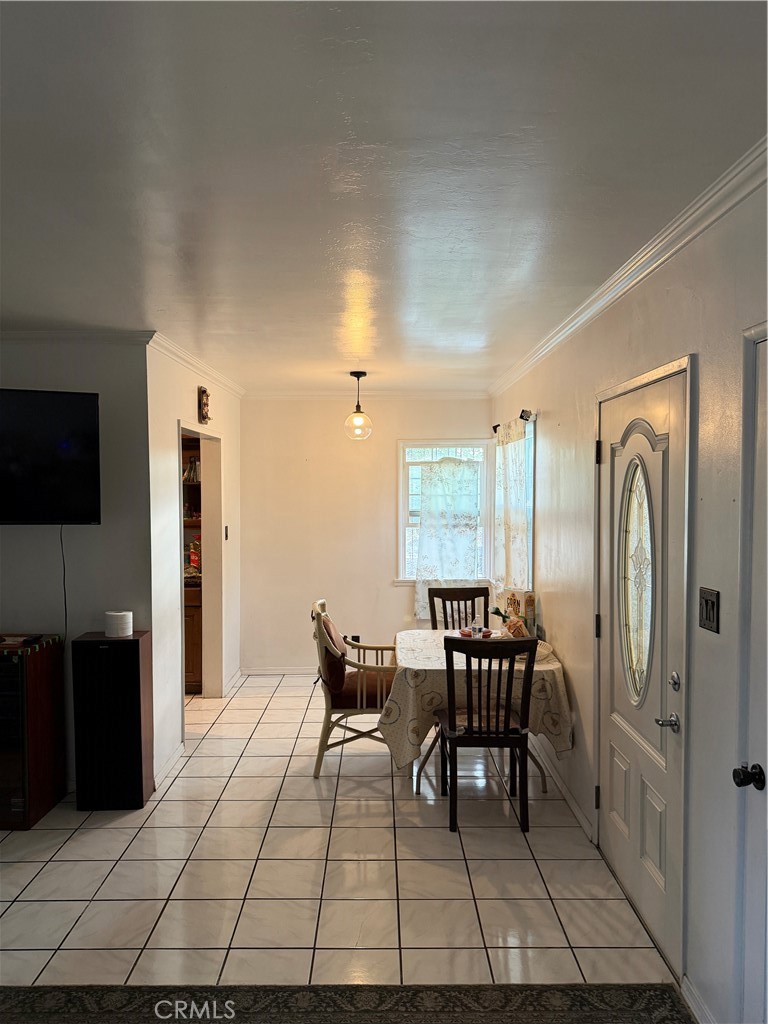 13116 Weidner Street Pacoima, CA 91331 - Photo 6 of 21 a view of a dining room with furniture window and outside view