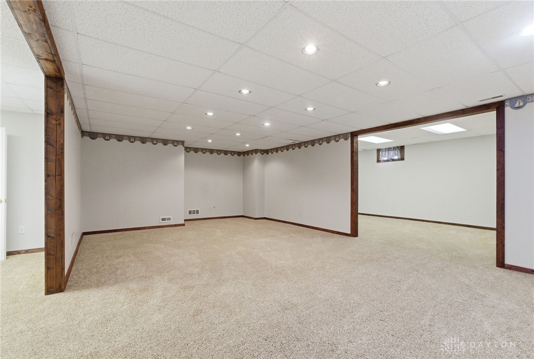 1540 Jasper Road Xenia, OH 45385 - Photo 48 of 91 This spacious basement offers a versatile layout, ideal for various recreational pursuits.
