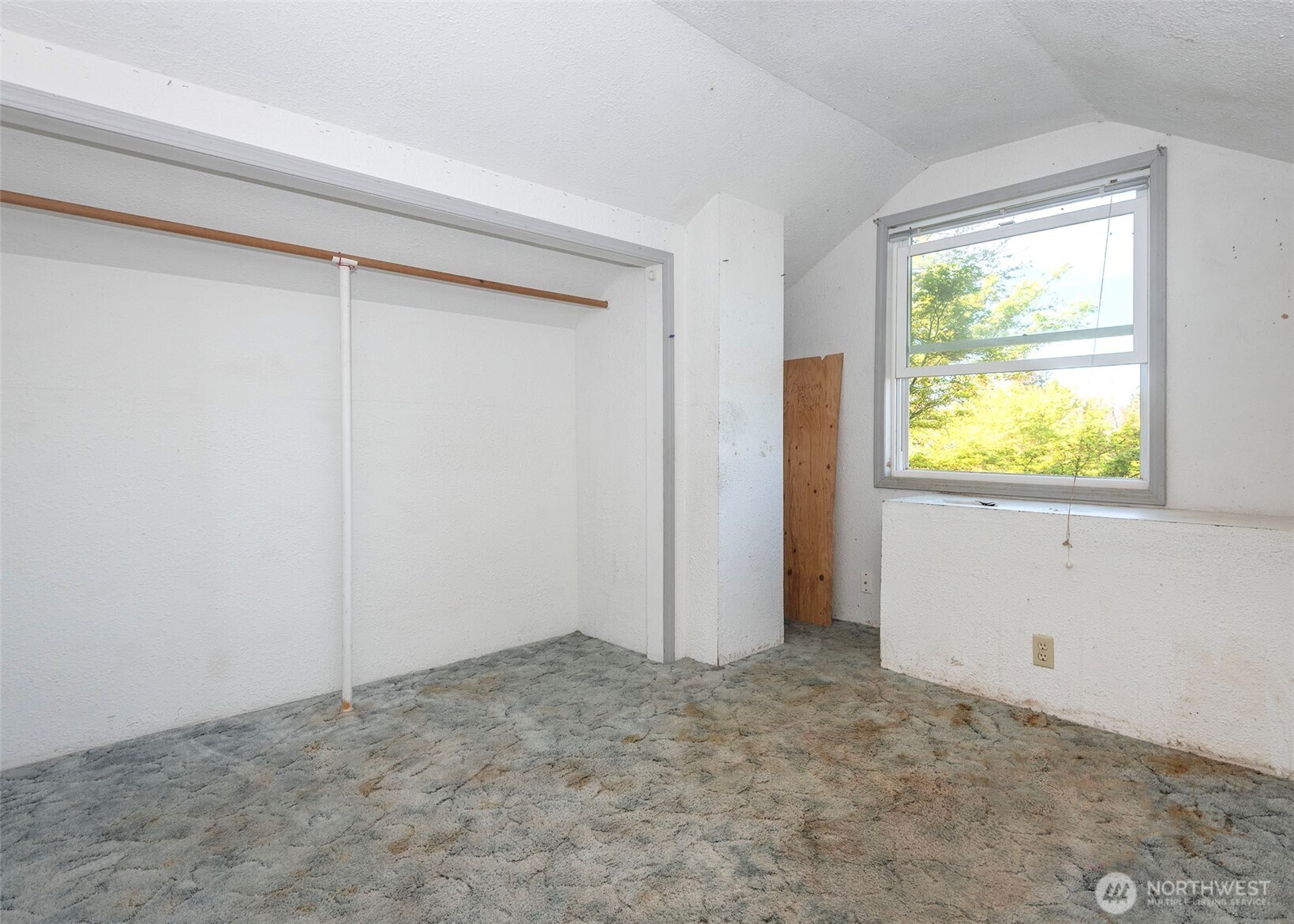 2214 North 60th Street Seattle, WA 98103 - Photo 18 of 22 a view of an empty room and window
