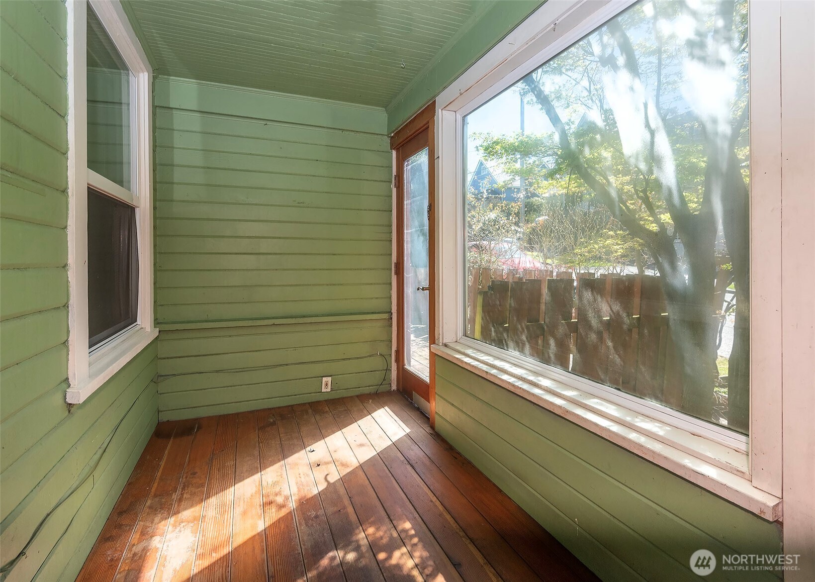 2214 North 60th Street Seattle, WA 98103 - Photo 6 of 22 a view of a glass door of the house