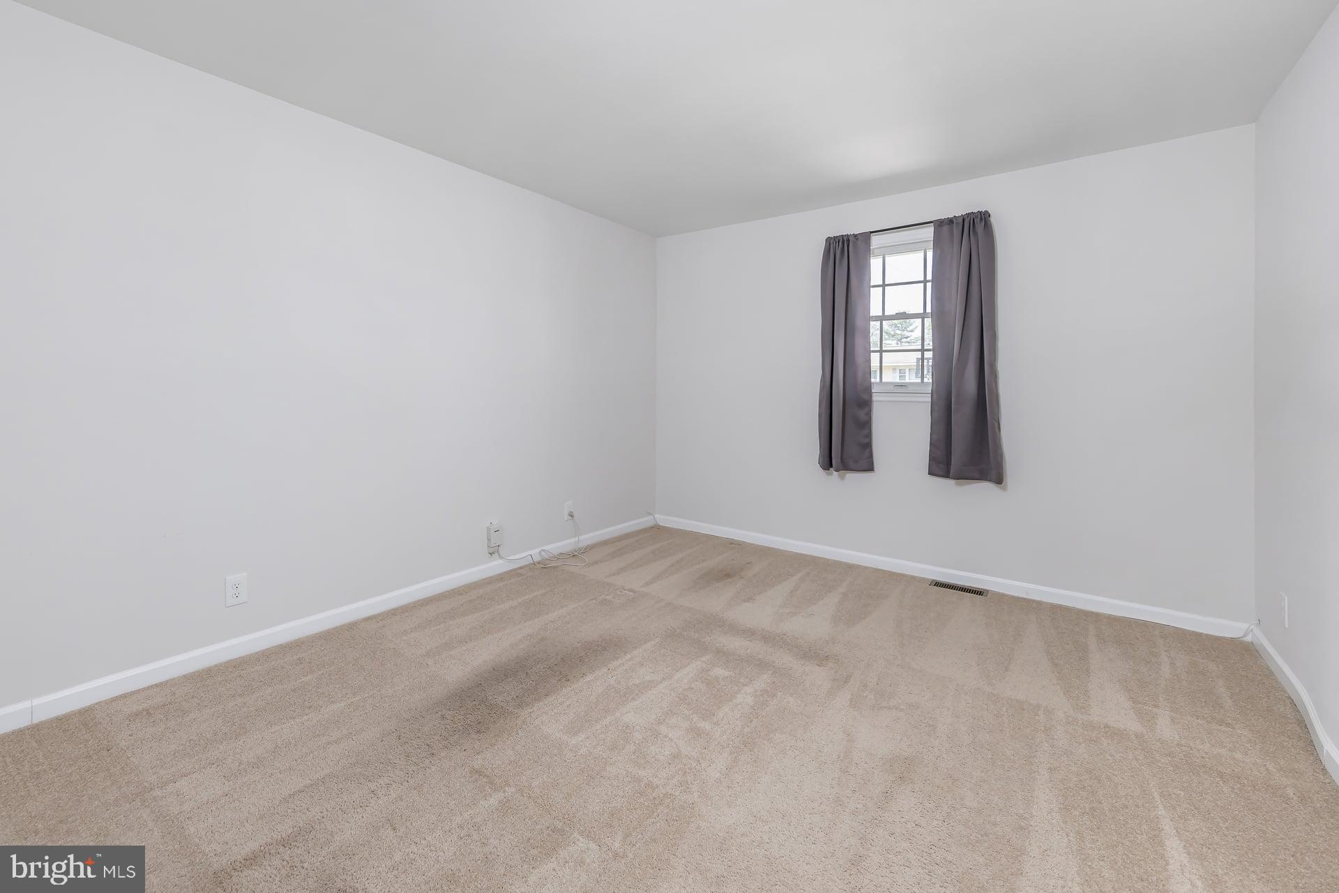 1203 Cedar Drive Pine Hill, NJ 08021 - Photo 13 of 19 an empty room with windows