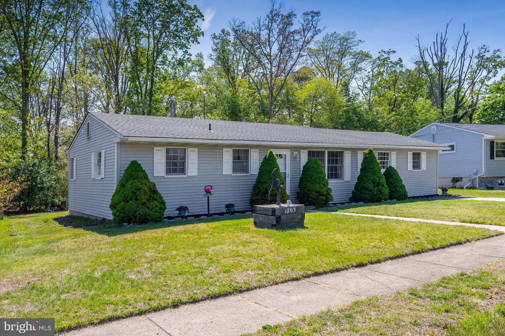 1203 Cedar Drive Pine Hill, NJ 08021 - Photo 19 of 19 a view of an house with backyard space and swimming pool