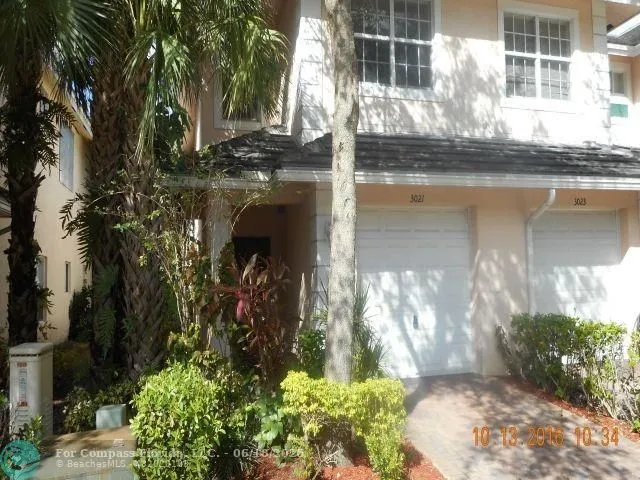 a view of back yard of the house and swimming pool