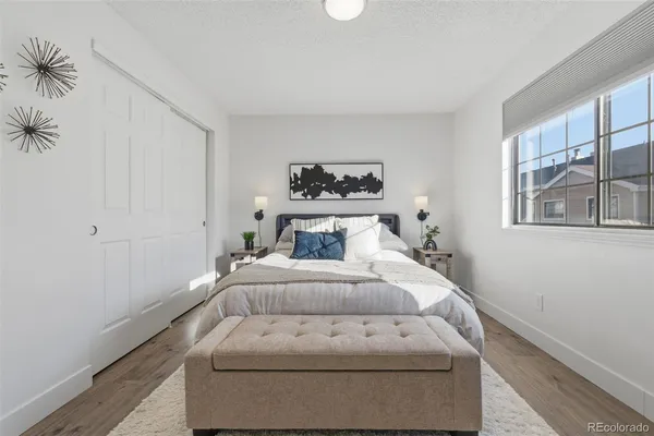 a large white bed in a white room