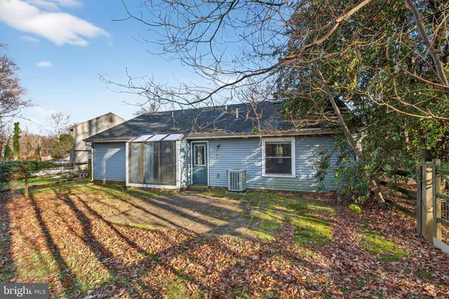 an aerial view of residential house with outdoor space