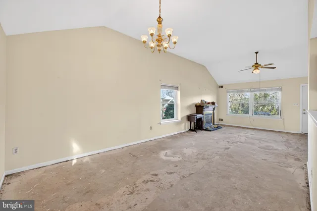 a view of a livingroom with a staircase