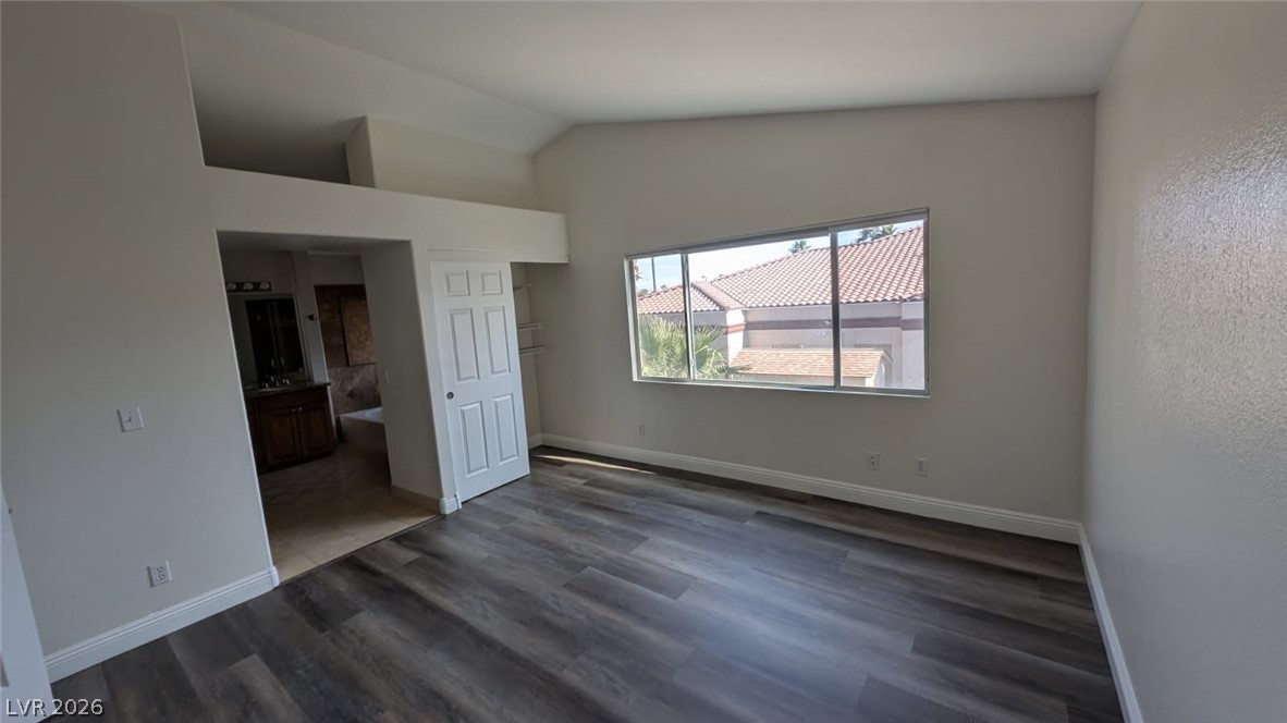2670 Ridgewater Circle Henderson, NV 89074 - Photo 13 of 22 This bright room features durable flooring, a convenient closet, and a view of the neighborhood.