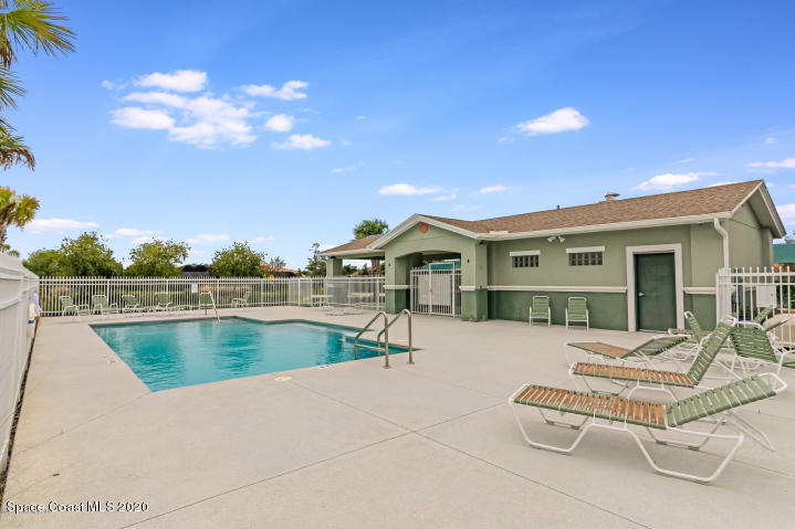 3465 Sedge Drive Rockledge, FL 32955 - Photo 11 of 12 a view of house with swimming pool and chair