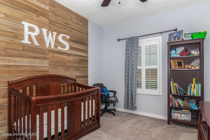 3465 Sedge Drive Rockledge, FL 32955 - Photo 7 of 12 a view of an front door with a livingroom