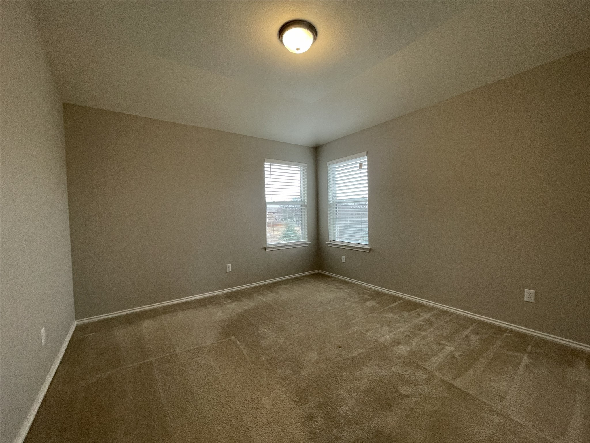 2471 Sunrise Road, Unit 62 Round Rock, TX 78664 - Photo 17 of 28 Carpeted empty room featuring baseboards