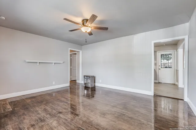 a view of an empty room and window