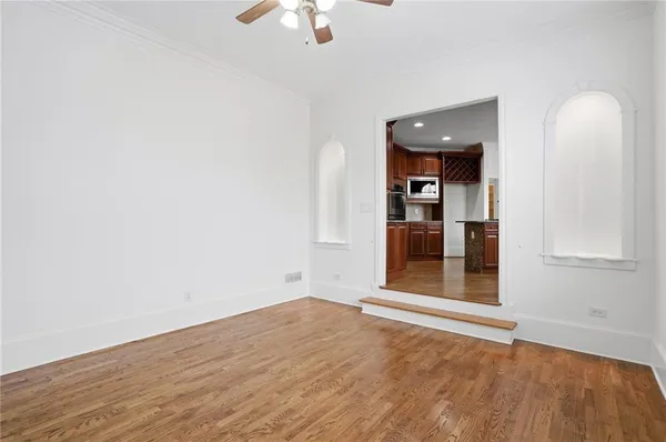 a kitchen with stainless steel appliances granite countertop a stove and a refrigerator