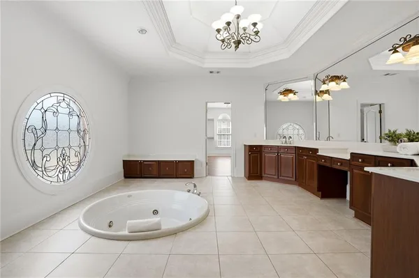 a bathroom with a bath tub and a shower