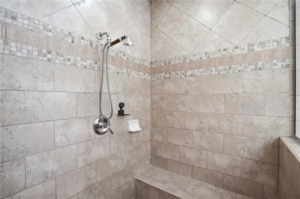a view of a house with wooden floor and balcony
