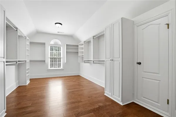 a view of a house with backyard porch and sitting area