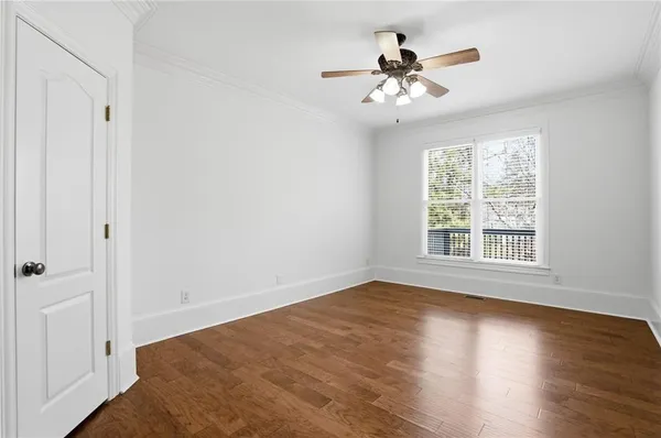 an aerial view of a house with a lake view
