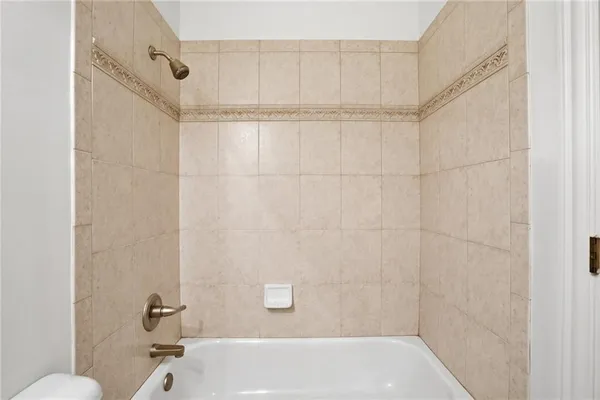 a view of a swimming pool with a yard