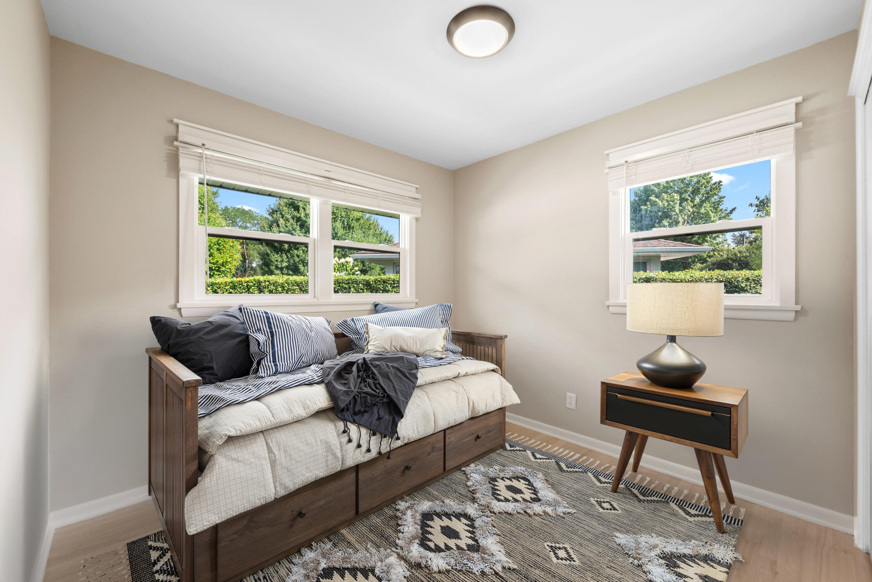 9176 West Springhill Drive St. John, IN 46373 - Photo 13 of 20 a bedroom with a bed and wooden floor