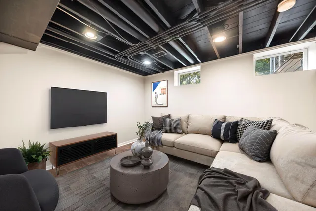 a bathroom with a shower a sink and a mirror