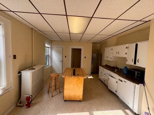a hallway with a car parked in it