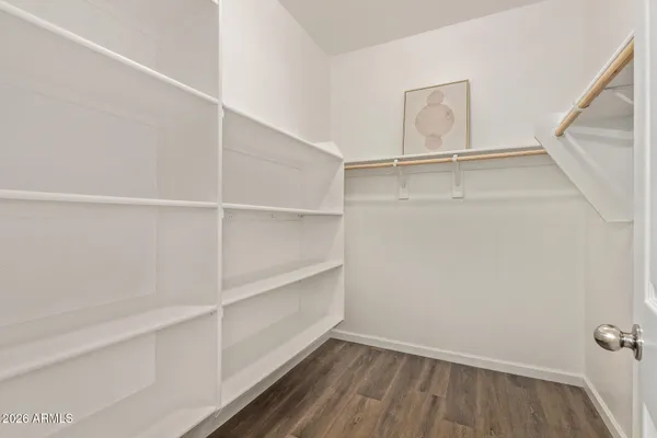 a view of an empty walk in closet