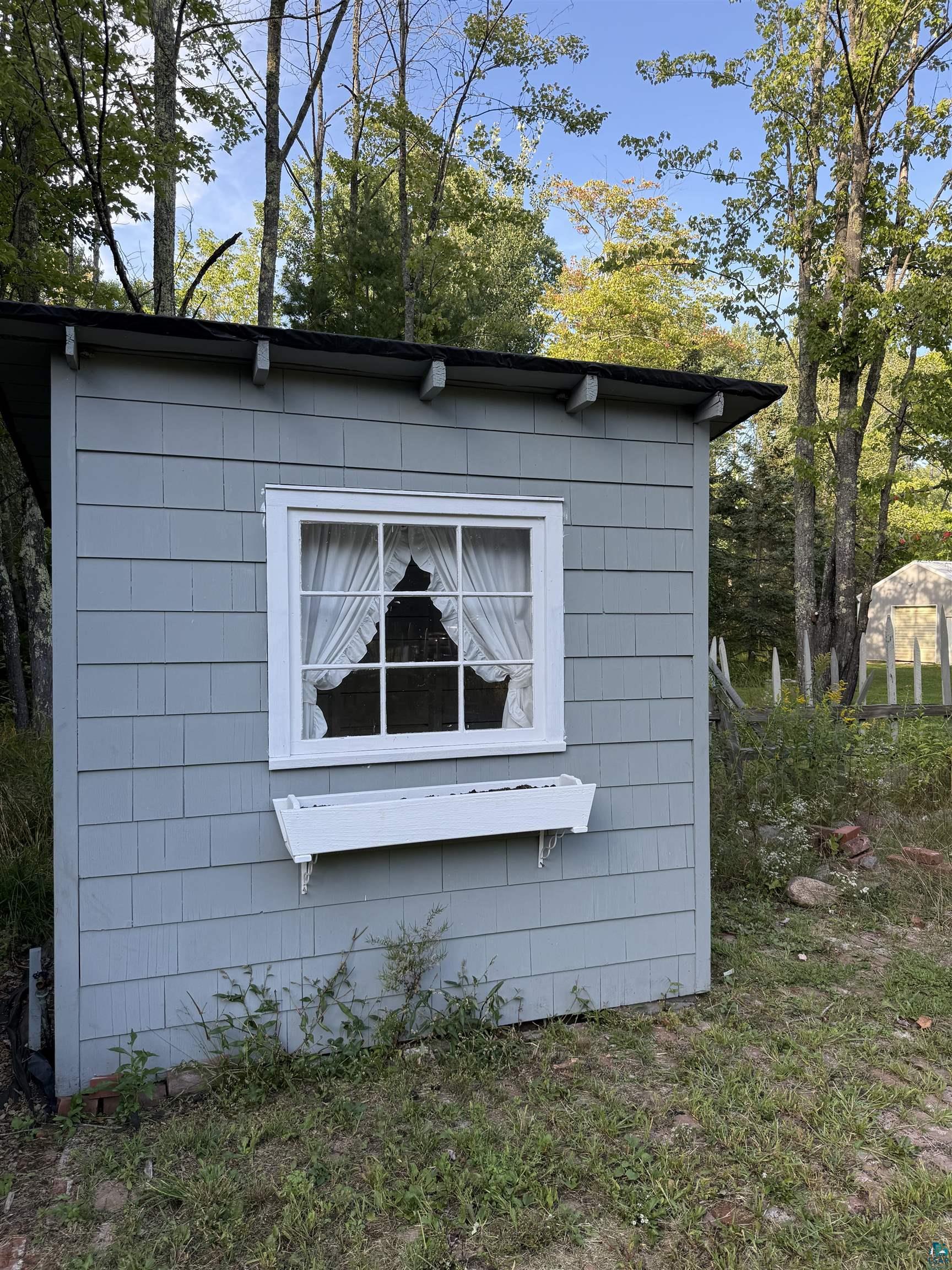 870 Chebomnicon Bay Road La Pointe, WI 54850 - Photo 51 of 53 Chicken coop converted to she-shed